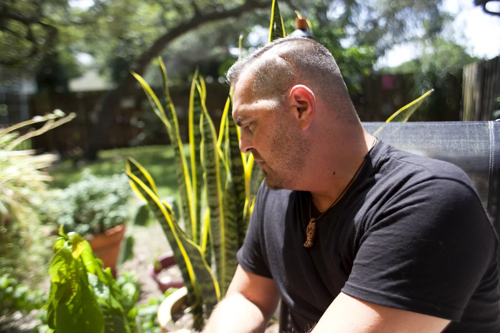 Roby Baird at home. Image shows the scar from Roby's brain surgery where he had 17 staples. Saint Augustine, FL.