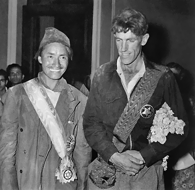   Tenzing Norgay and Edmund Hillary wear decorations given them by the Kingdom of Nepal after their historic ascent of Mt. Everest.  