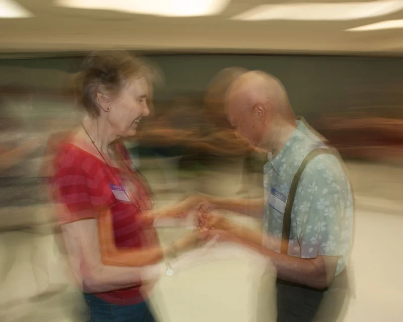 Two attendees to the Easing Memory Loss event on June 17, 2017 at the Davis Senior Center located in Davis, Calif. dance after watching "Alive Inside," a documentary about music activating memory in dementia sufferers.