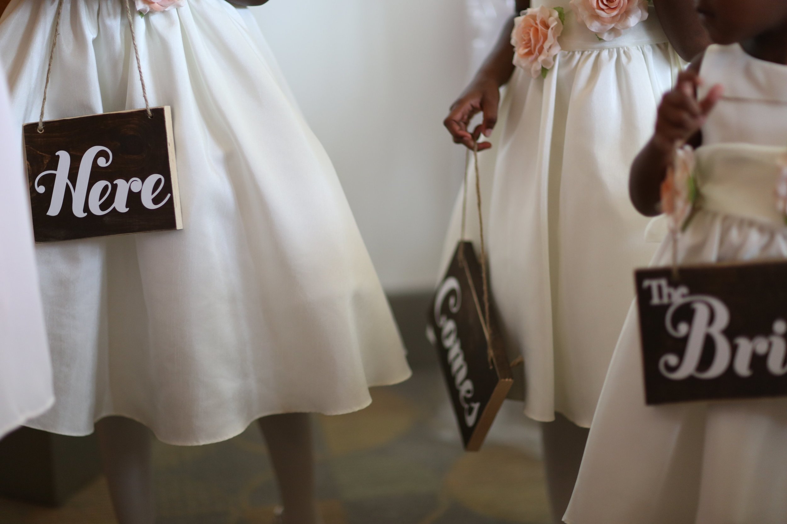 These signs were hand crafted by my brother (Petra Pream) and were so perfect for the three flower girls.