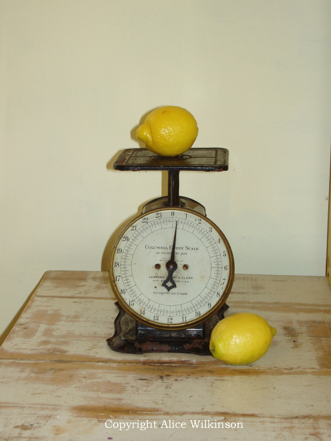 scale and 2 lemons