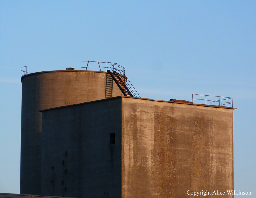 cube and cylinder with ladder