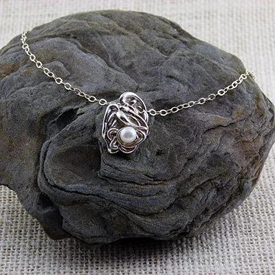 Hot wax drizzled in water cast pendant with fresh water pearl, 18" sterling silver chain - $115.