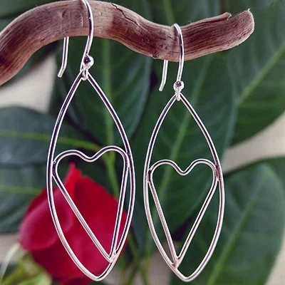Sterling silver leaf and large heart earrings - $72.