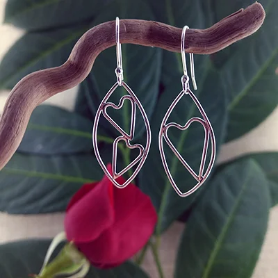 Sterling silver leaf with single and double heart earrings - $70.