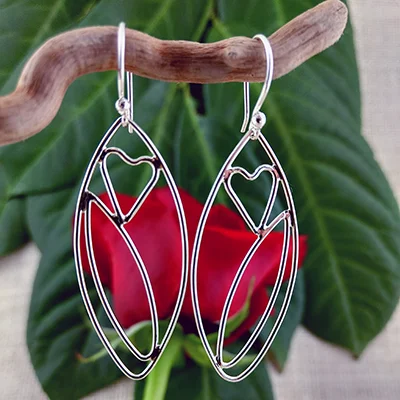 Sterling silver leaf and small heart earrings - $72.