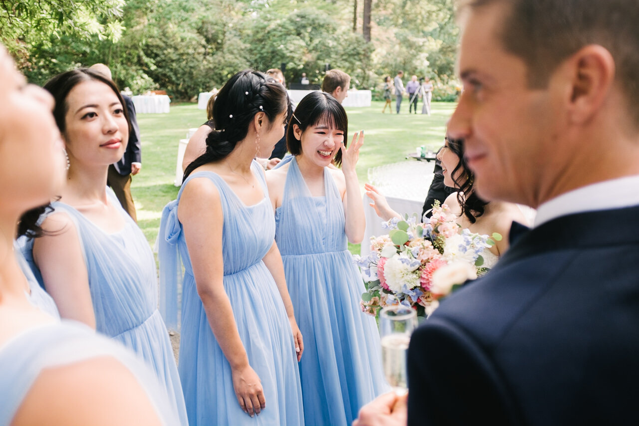  Bridesmaid in blue dress weeps with joy after wedding 