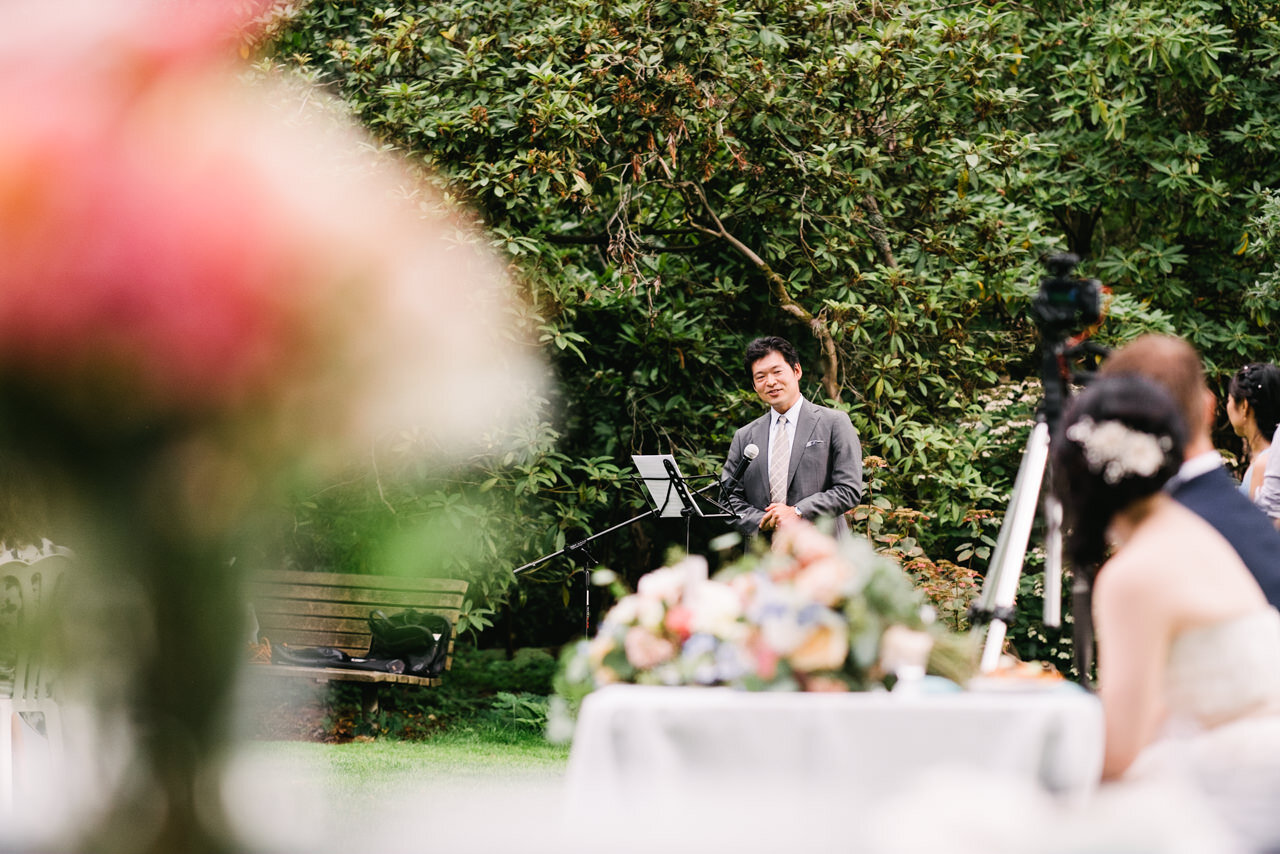  Wedding toast by guest at rhododendron garden 