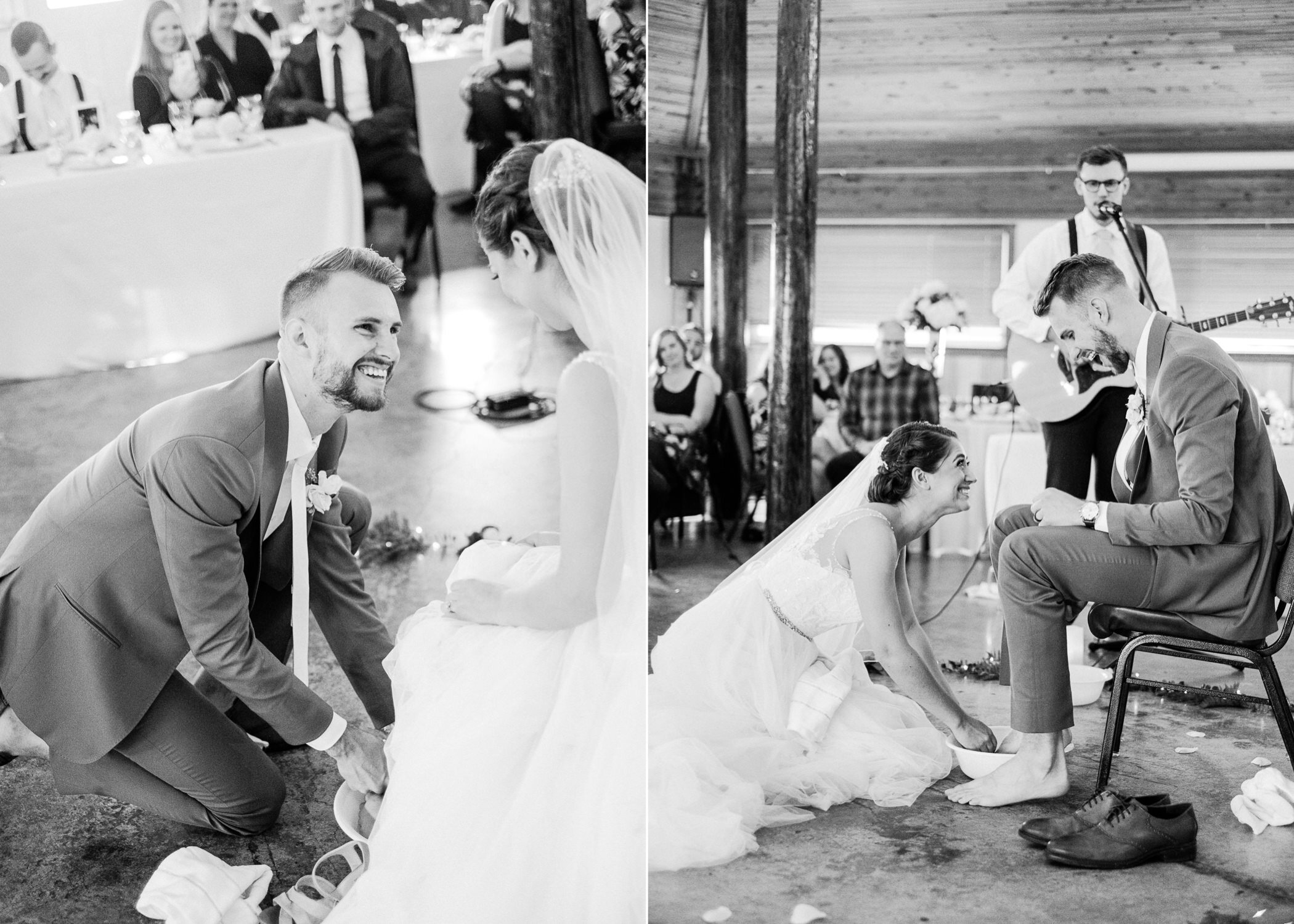  Bride smiles at groom while washing his feet during wedding ceremony 