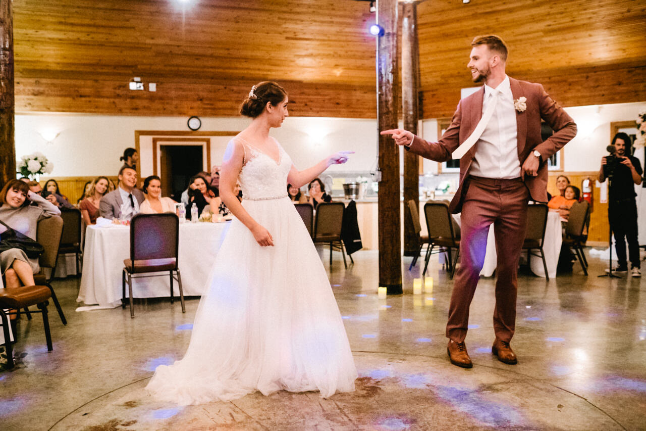  Bride and groom point at each other during funny first dance 