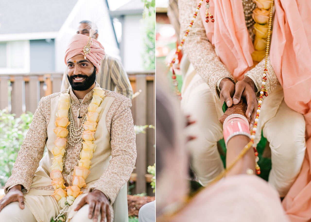  Smiling indian groom wears yellow rose necklace 
