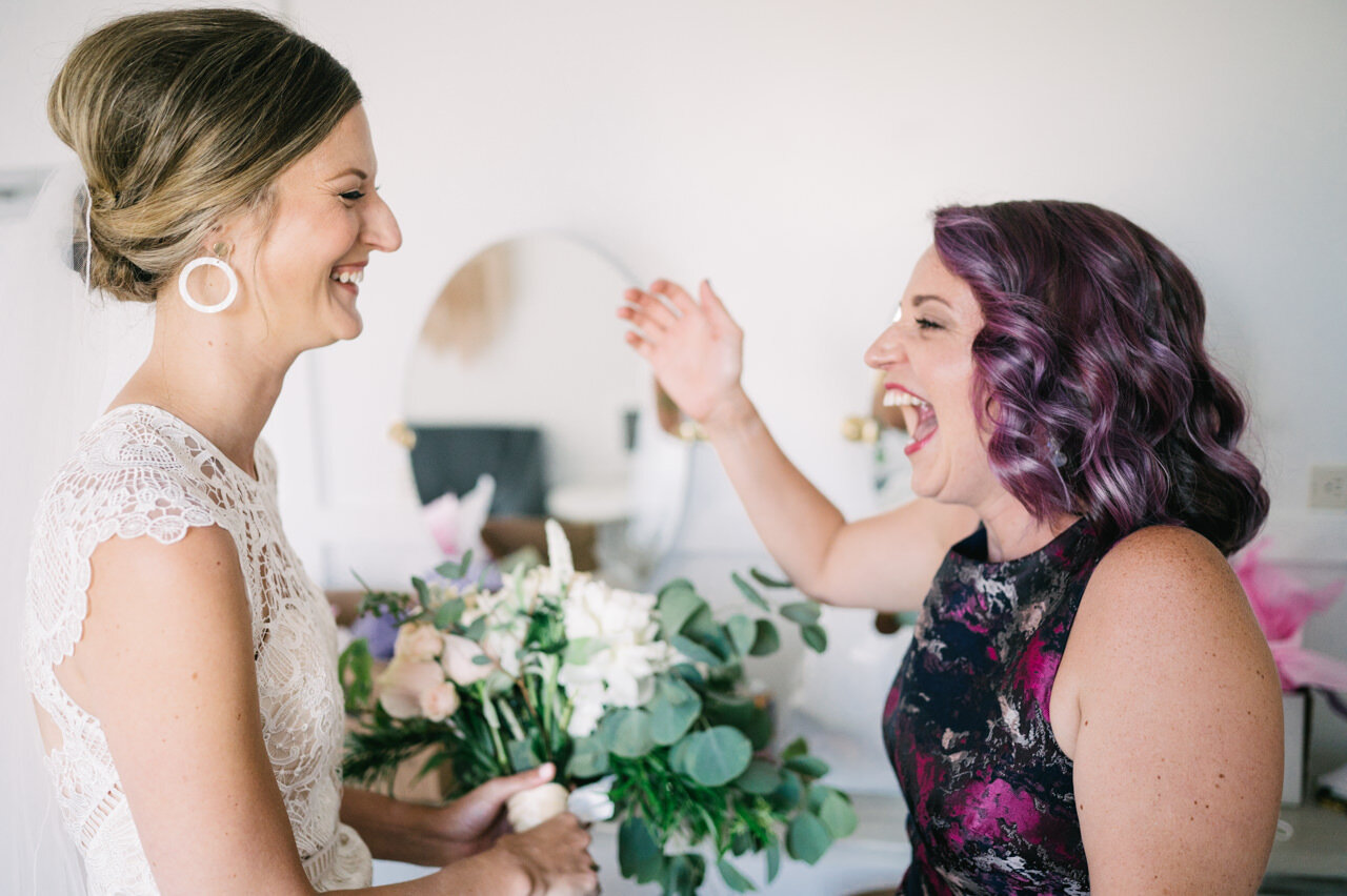  Maid of honor with purple hair laughing hysterically 