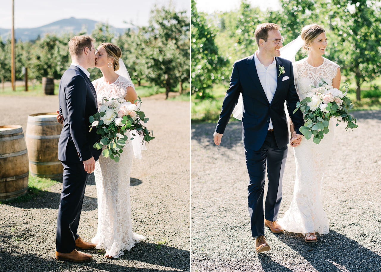  Bride and groom walking together in orchard with bouquet 