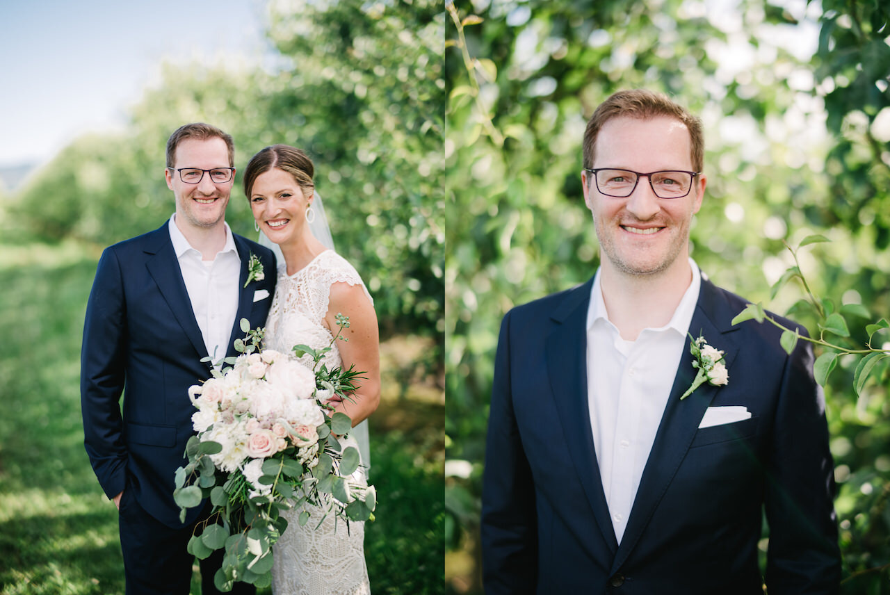  Groom portrait with blue suit no tie and white boutonniere in pear orchard 