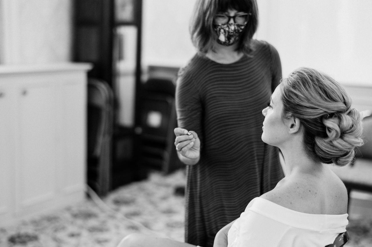  Bride in a pause with hair and makeup 