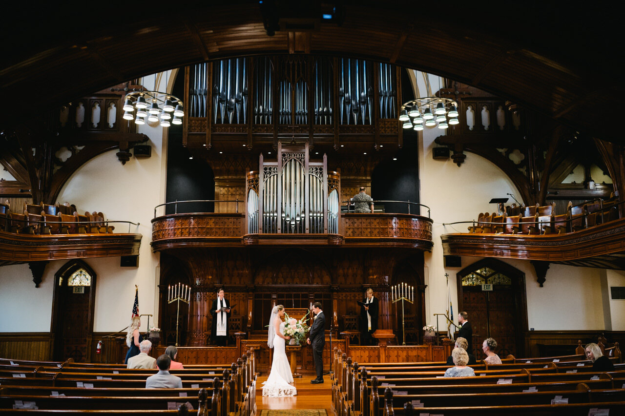  Wide angle photograph of empty cathedral wedding during covid 