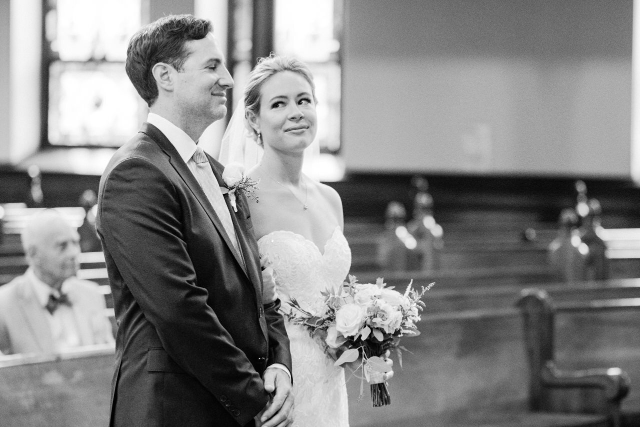  Bride gives meaningful look at groom during the wedding ceremony 