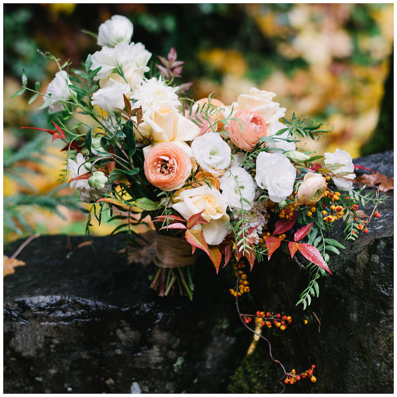  Colorful fall bouquet with pinks, orange, and reds 