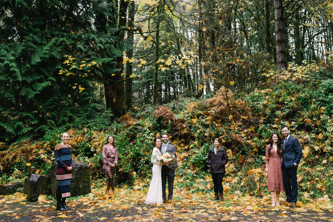  Covid group photo of family and guests socially distanced in fall elopement wedding ceremony 