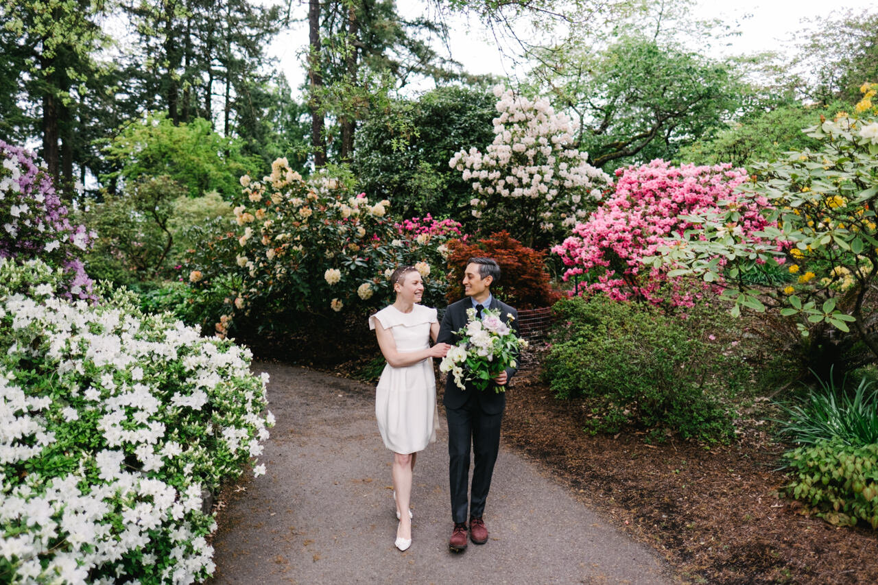  Elopement among blooming rhododendron trees 