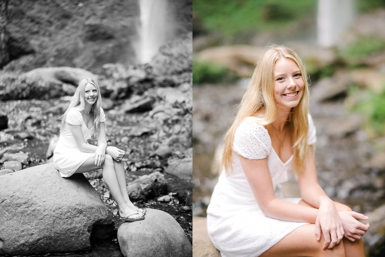  Laughing blonde high school senior portrait sitting on rock in creek 