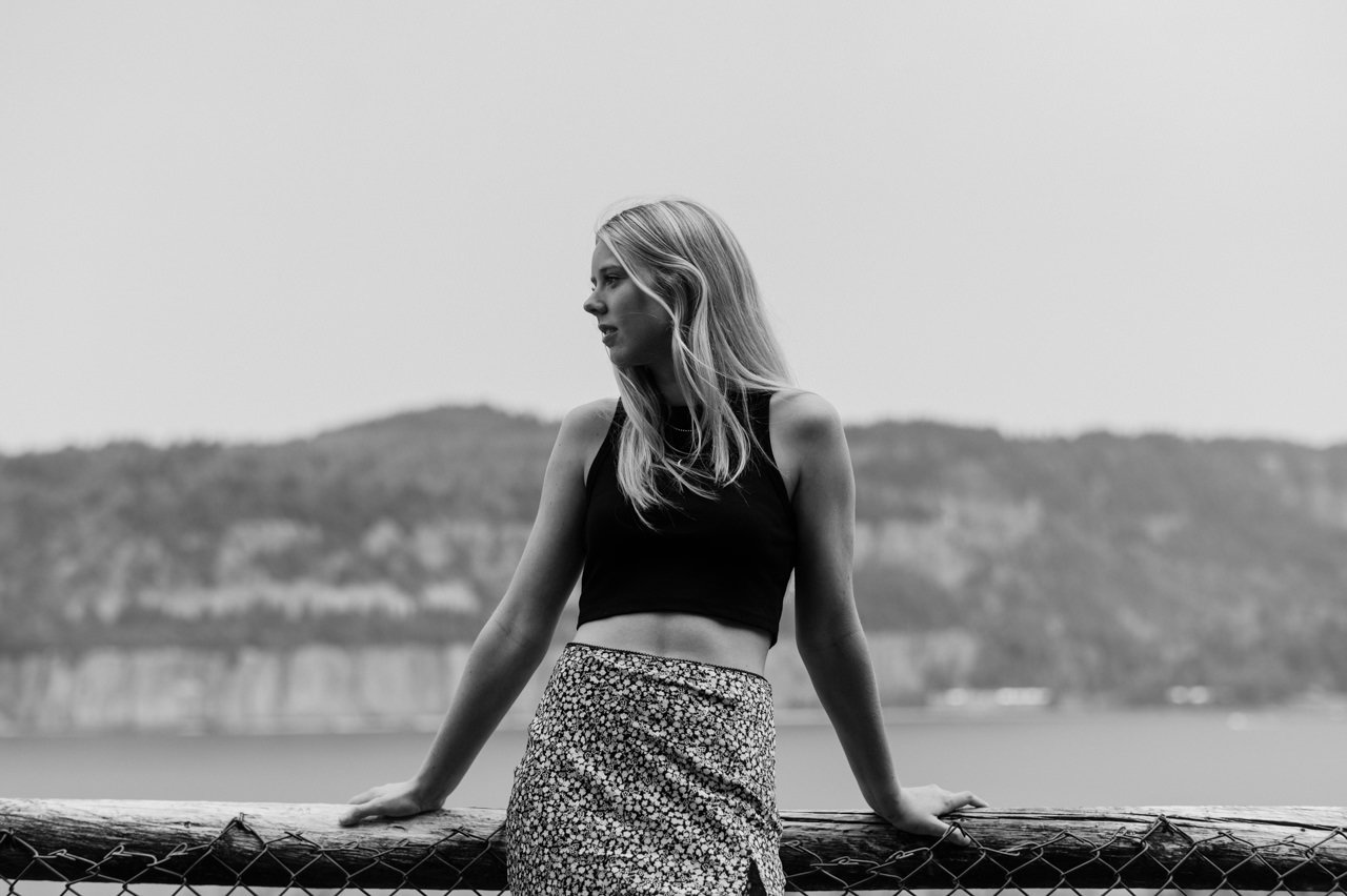  Black and white candid photo of blonde senior girl in Columbia Gorge 