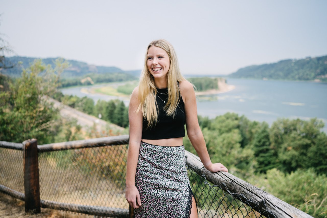  Laughing portrait of high school student with Columbia river in background 