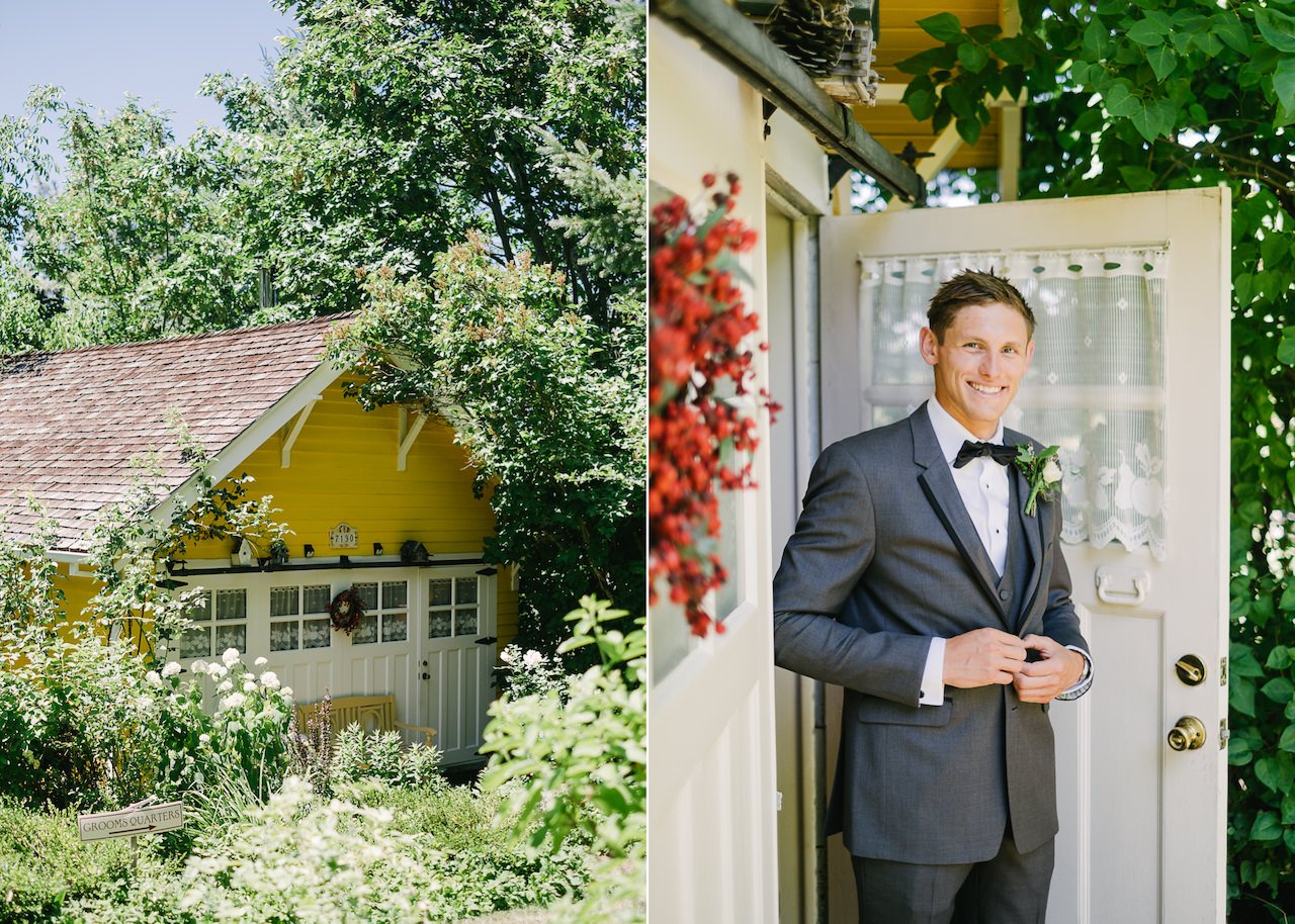  Groom in grey suit buttons jacket in front of Yellow orchard house 