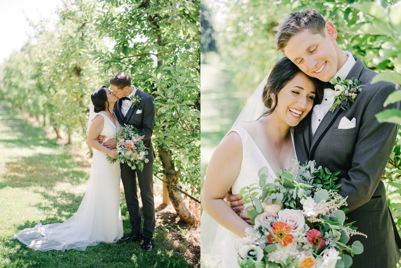  Couple kisses in pear trees in sunny wedding portrait 