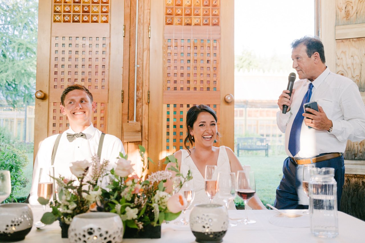  Father toasts bride and groom in apple house 