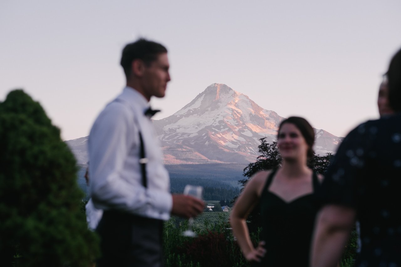  Mt hood in evening orange light in focus with guests blurry 