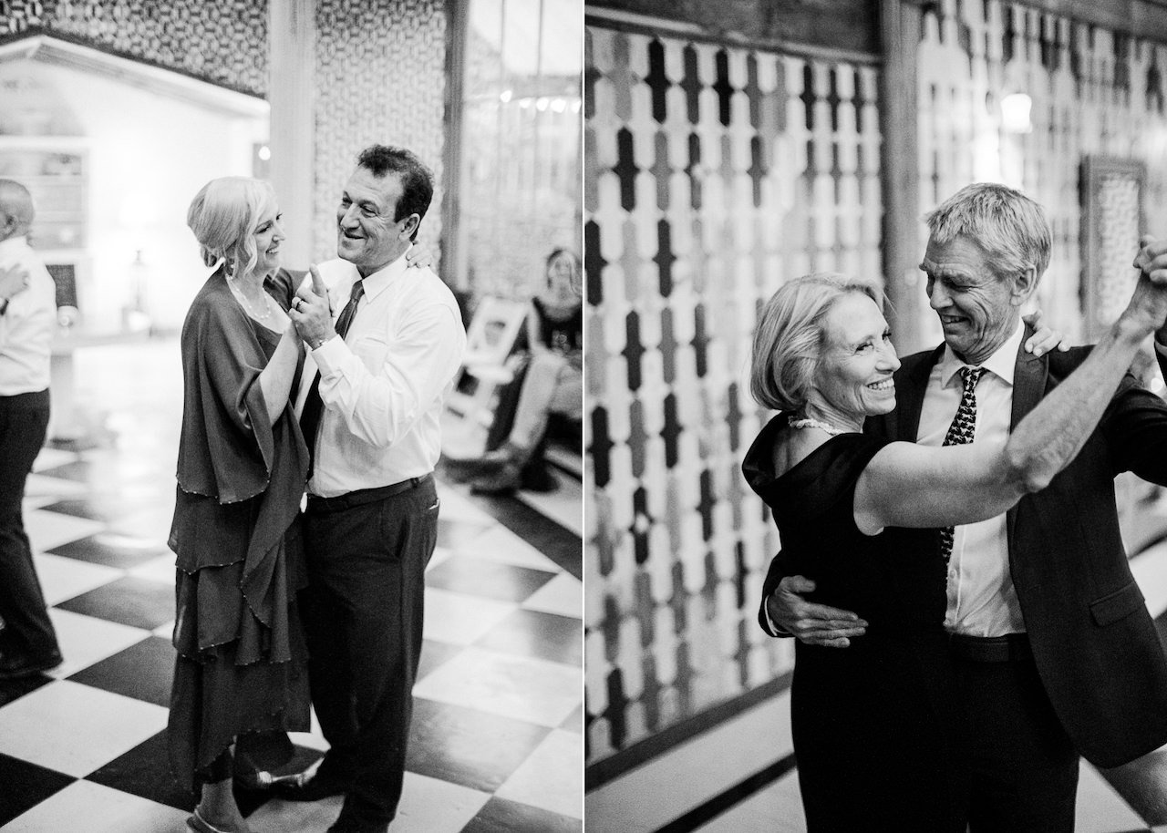  Parents of bride and groom share dances in black and white 