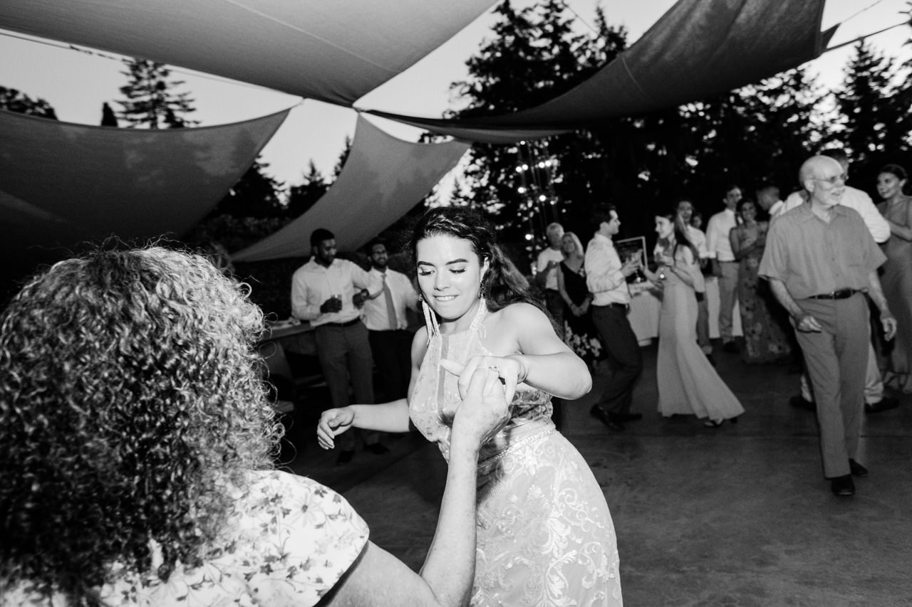  Bride dances with mother in salsa dance 