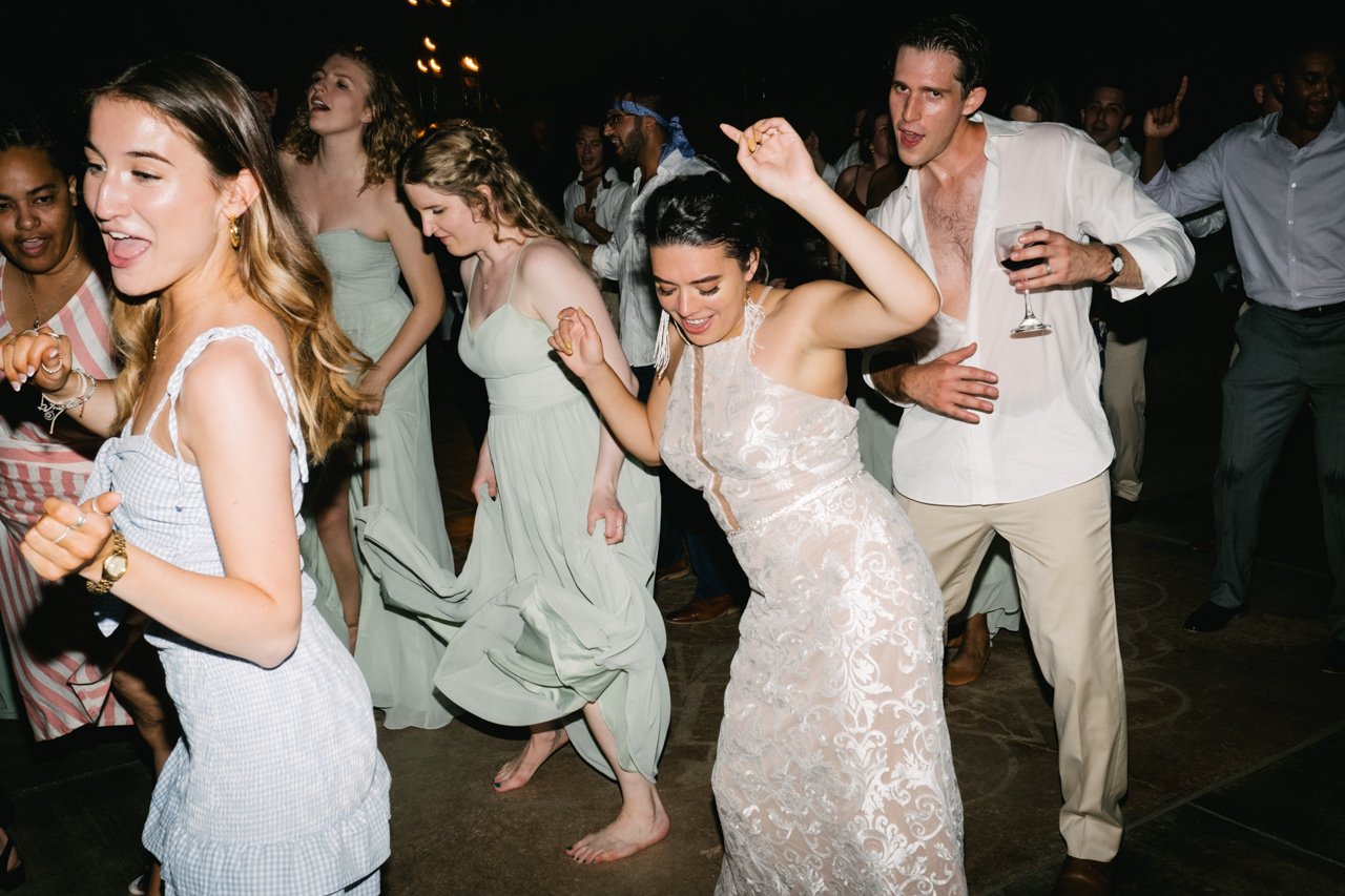  Bride and groom dance cupid shuffle in candid dance party 