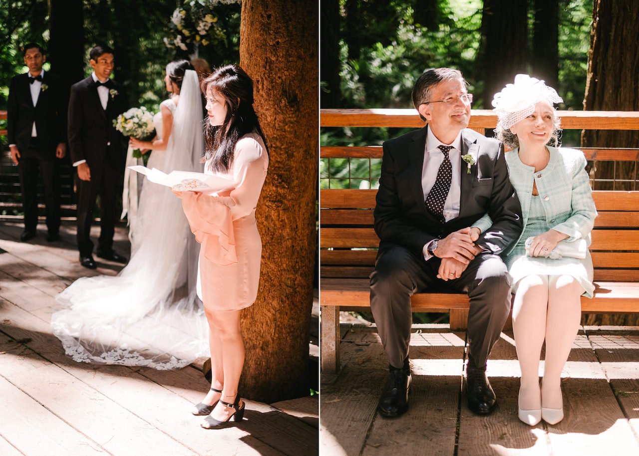  Sunlight shines on wedding ceremony while mother and father of bride sit on redwood bench 