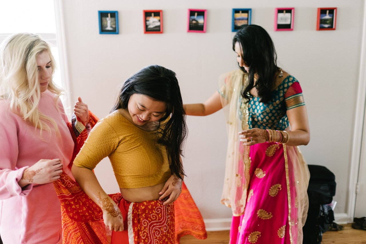  Colorful saris on bridesmaids getting ready 