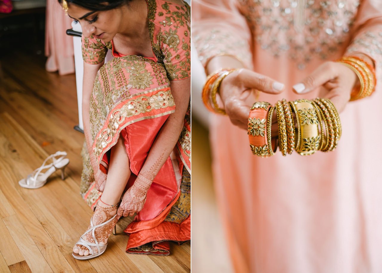  Bride with henna on feet puts on shoes and gold bangles 