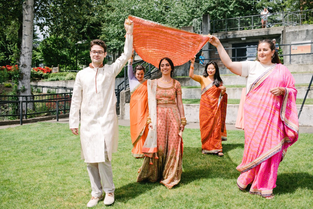  Indian bride under covering on wait to ceremony at Roehr park 