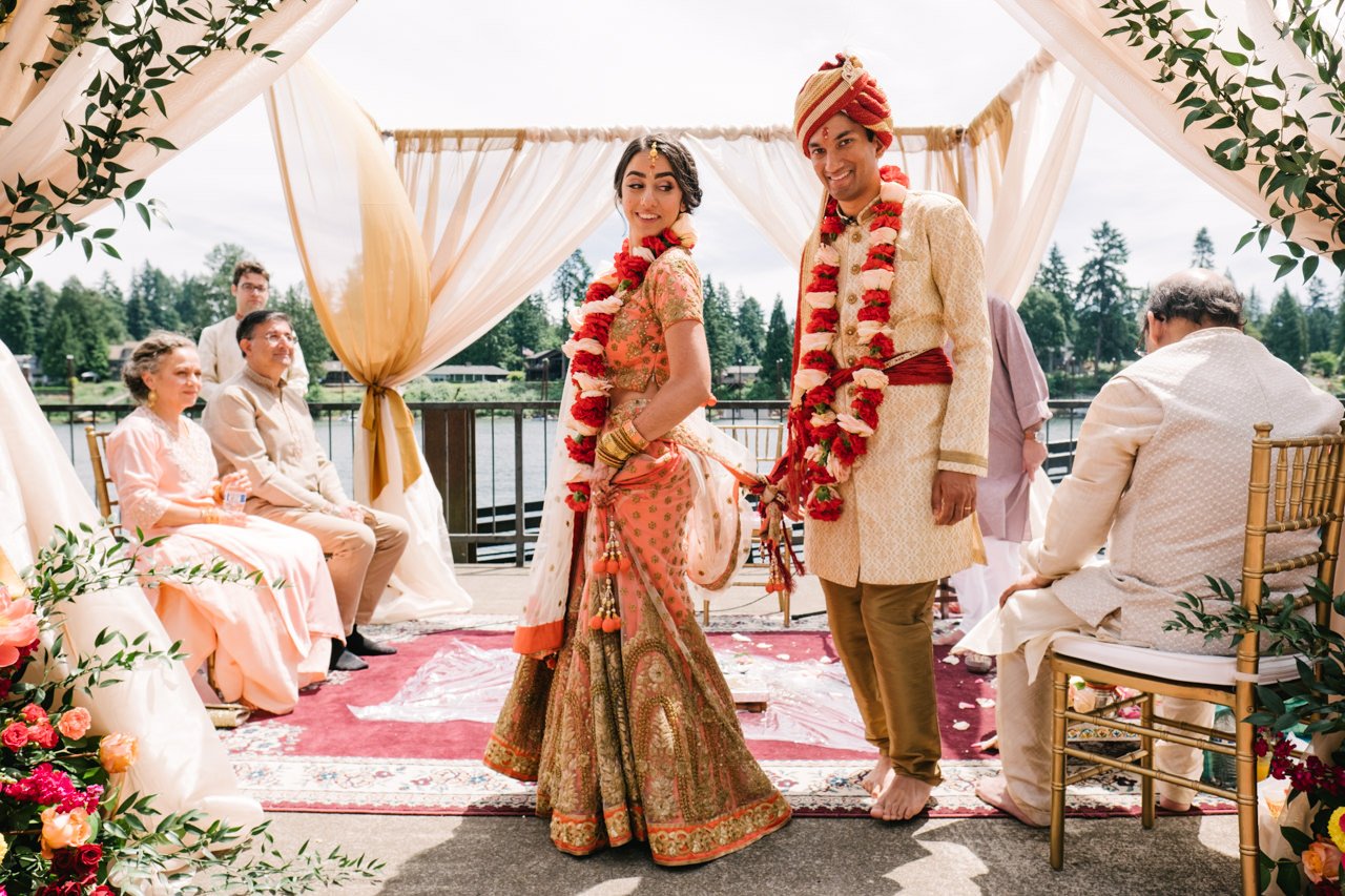  Bride and groom walk seven times around fire in mandap ceremony 