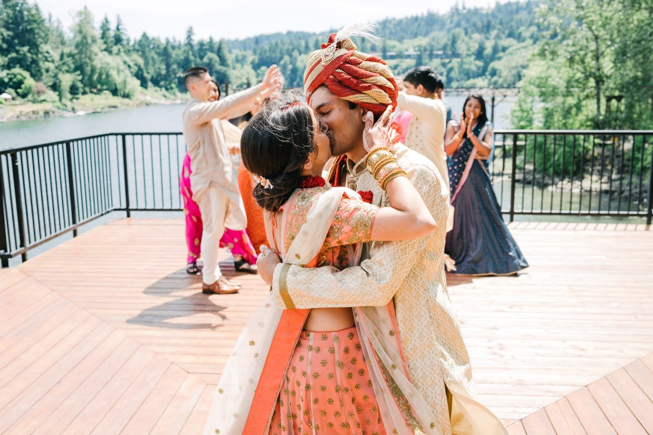  Indian couple shares kiss on platform at Roehr Park after wedding ceremony 