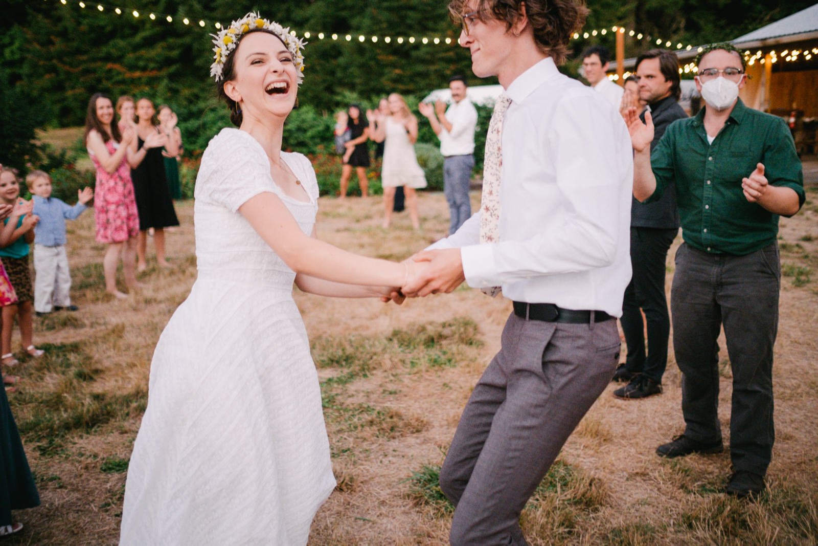  Bride laughs during English line dancing 