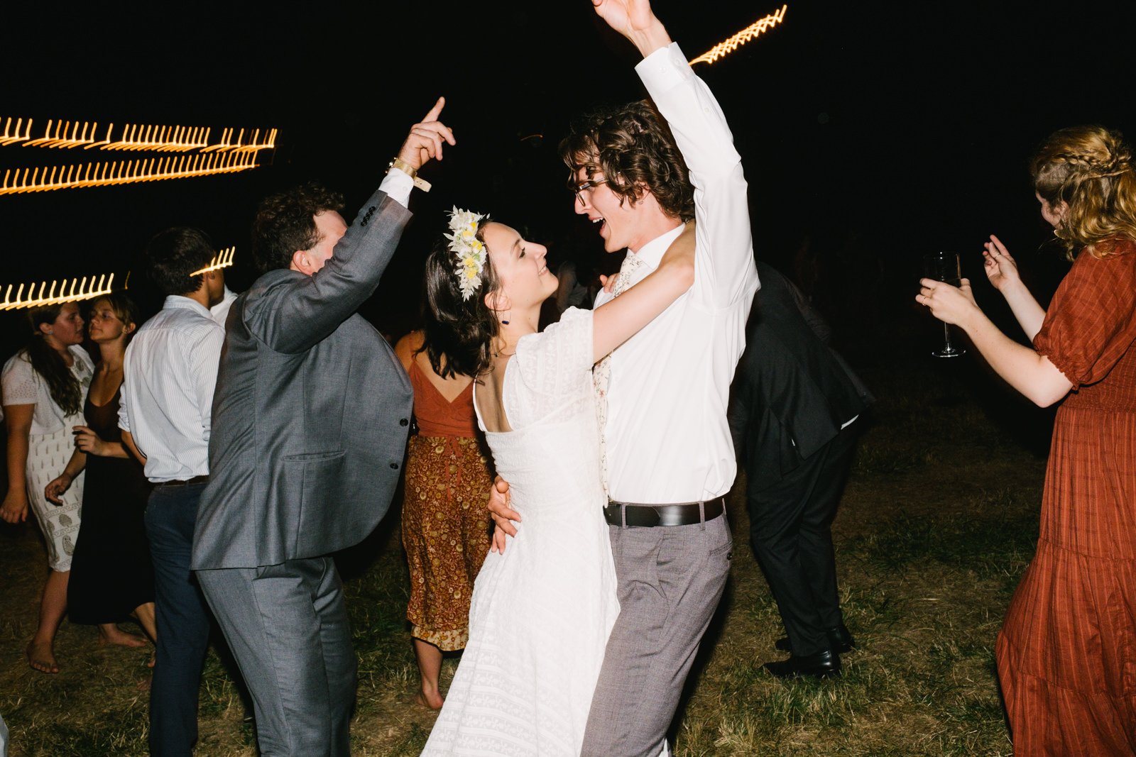  Bride and groom dance together during party 