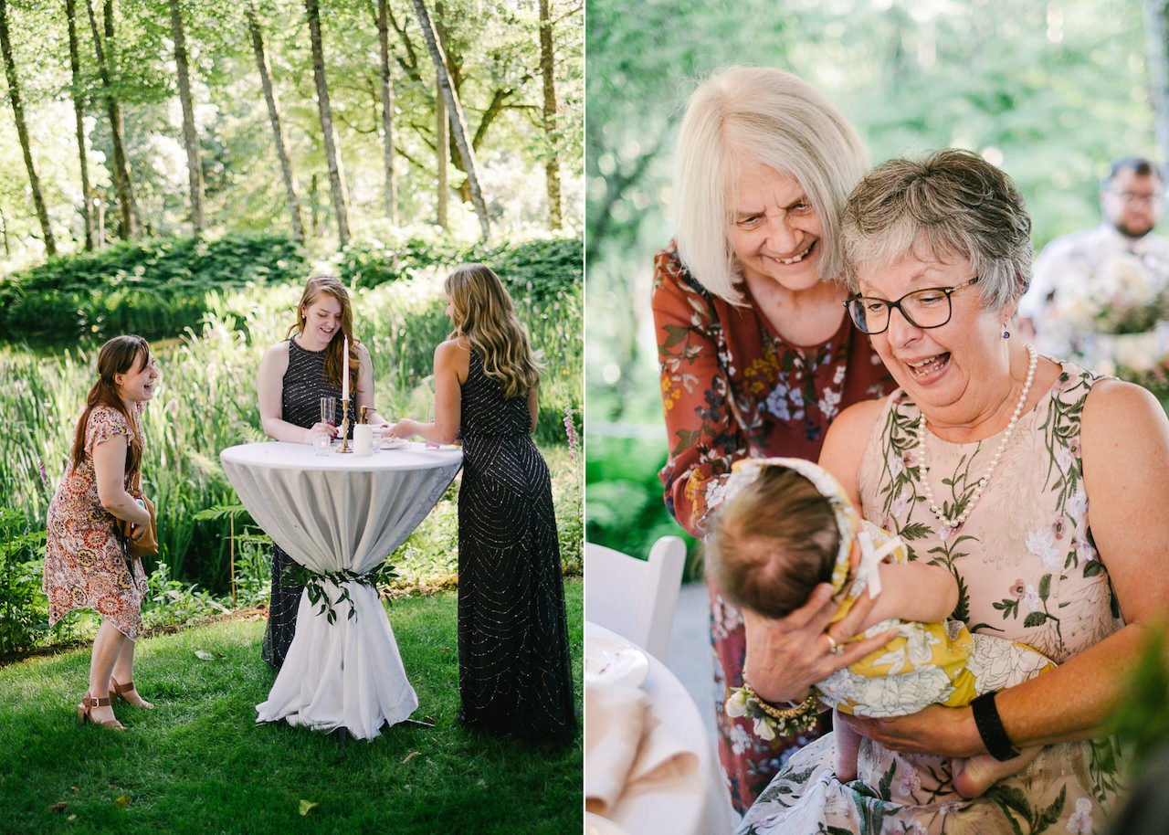  Mother and guests hold cute baby in floral outfit 