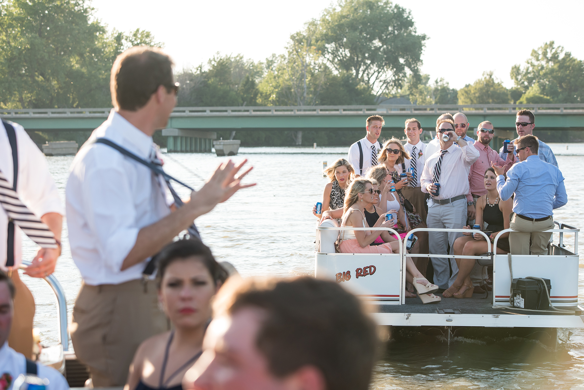 PONTOON RIDE AT NEBRASKA WEDDING.jpg