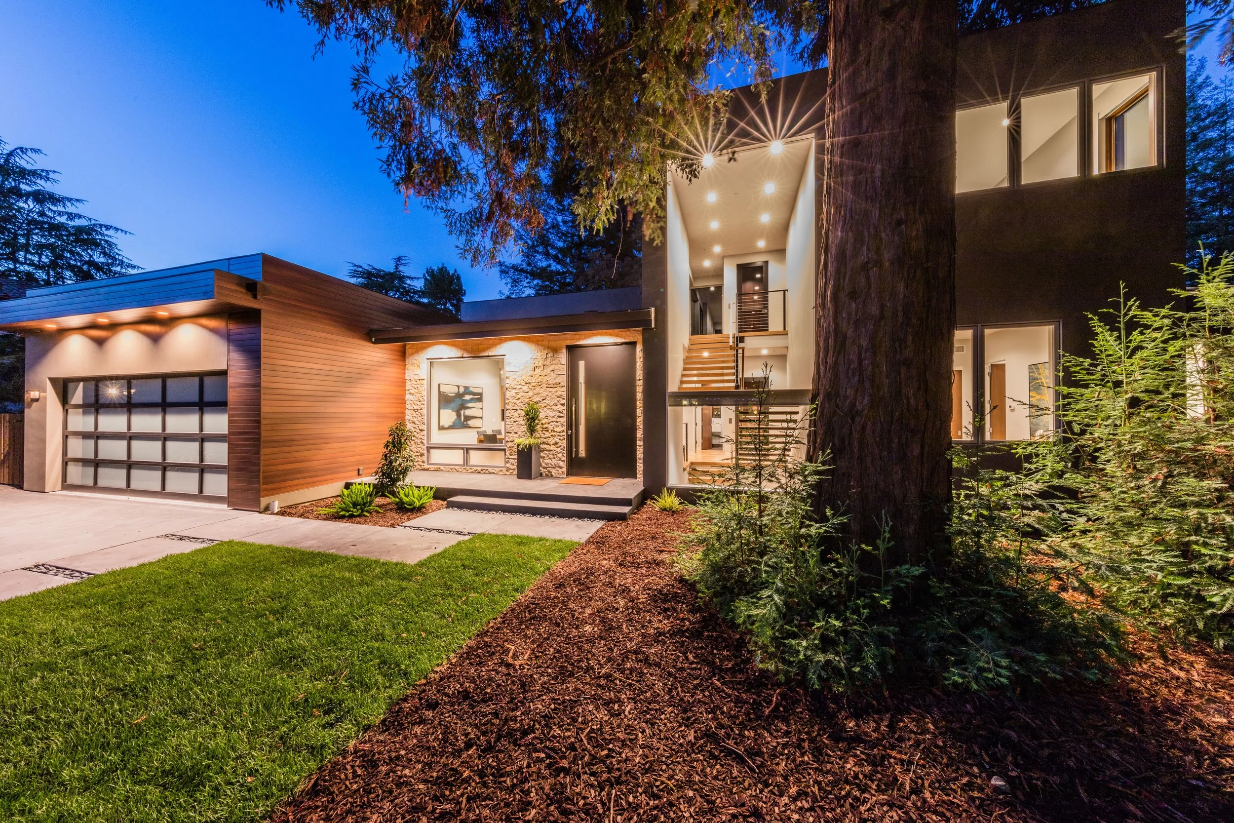 PLEASE also visit the 3D tour of this beautiful house. https://protect-us.mimecast.com/s/X8WEBXc56VgOuz Newly constructed contemporary masterpiece in Menlo Park CA. Walking distance to downtown. Features 5 ensuite bedrooms and approximately 5,900 sq. ft. of living space on 3 levels. This magnificent home offers luxury amenities such as radiant heated floors, a 14ft X 5ft Calcutta marble kitchen island, and Porcelanosa cabinets, tiles and fixtures. Other features include a rooftop deck, movie theater, one of a kind (wood and glass elevator), plus wine cellar and a home gym with glass walls.