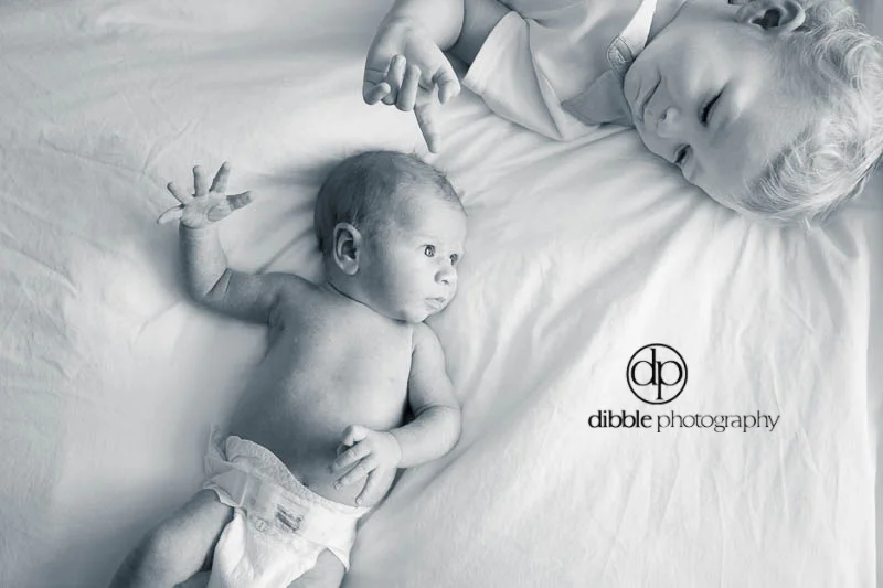 newborn with brother