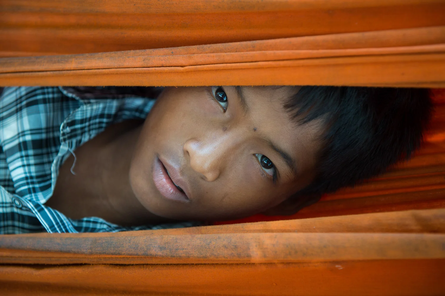 Boy in hammock; Nikon D4S, 70mm, f/4, 1/200s, ISO 400