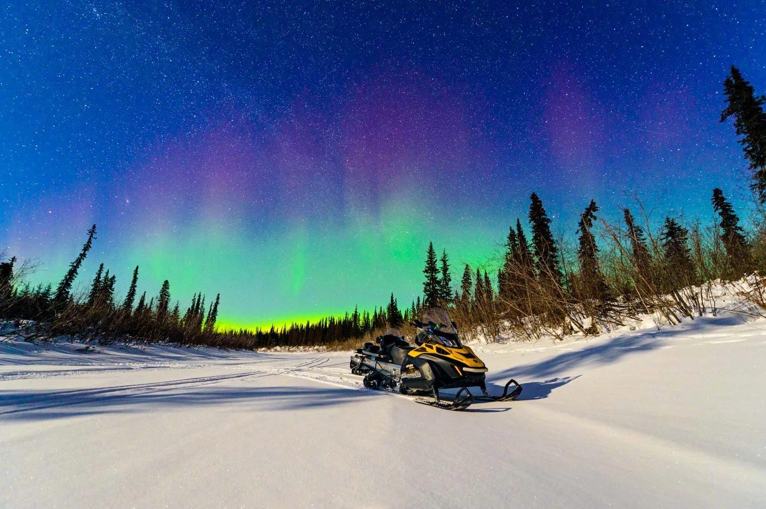 Exploring the remote wilderness of Alaska’s interior at night with the Northern Lights under a full moon; Nikon D800E, 14–24mm, f/2.8, 20s, ISO800