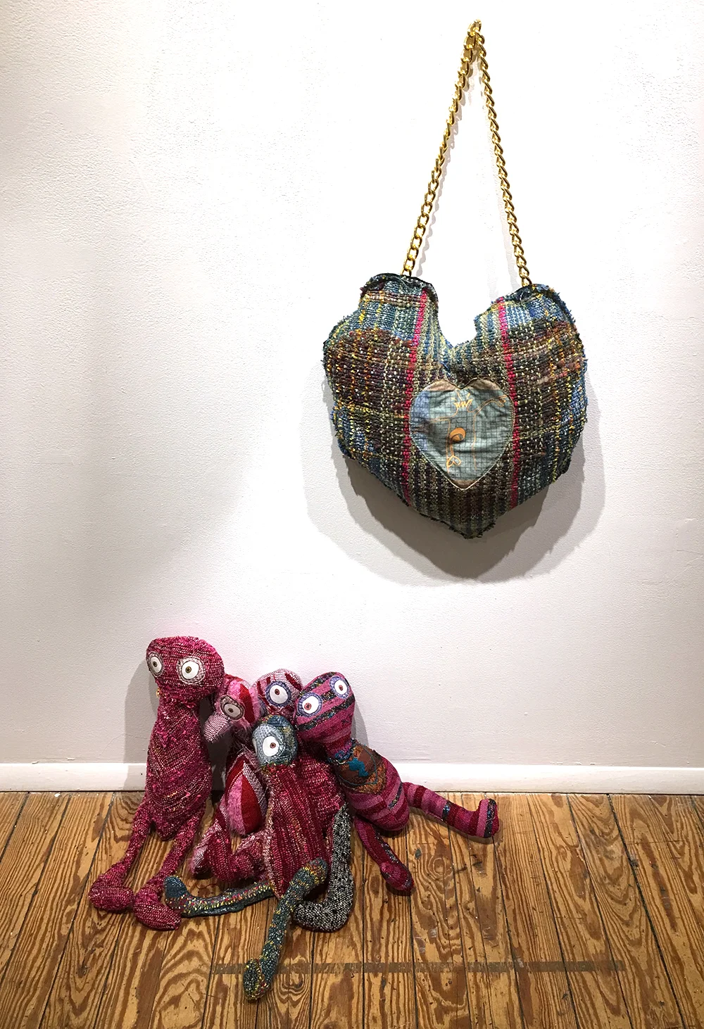 Just Send Flowers (left) h: 17" x w: 20" x d: 8" hand-woven and machine-made fabric, embroidery, inkjet prints, fleece 2017 Blow My Brains Out h: 17" x w: 13" hand-woven and machine-made fabric, embroidery, inkjet prints, fleece, chain 2017
