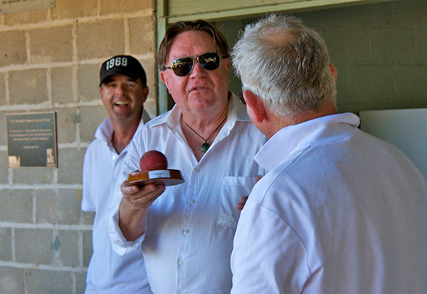 Bryan Dawe presents Maygars Ball to Captain Scotty McKay as Captain Greg Palmer looks on
